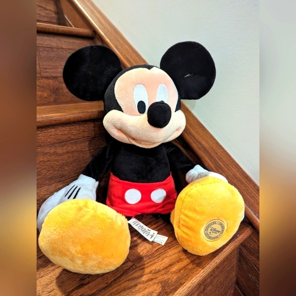The Disney store Mickey Mouse Plush  In excellent condition
